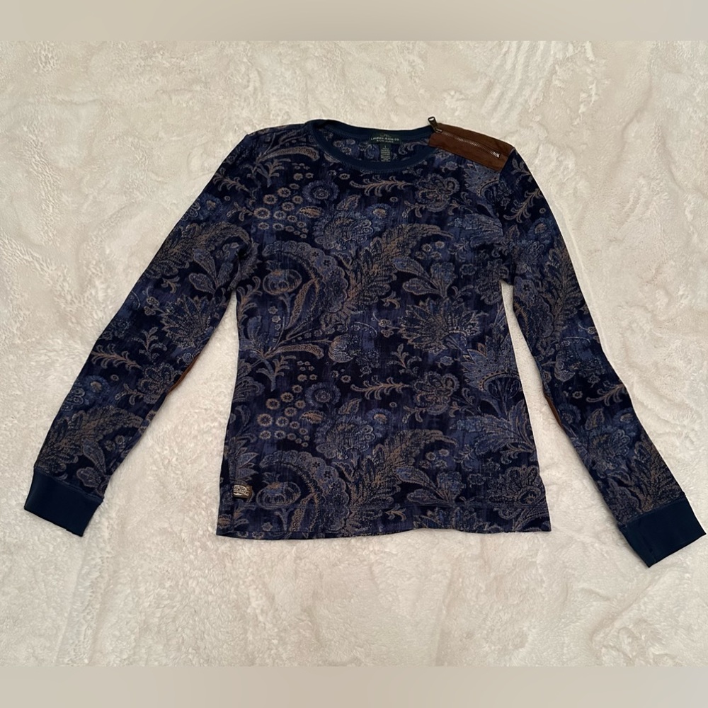 Kids navy blue Ralph Lauren shirt with designs, and size L.
